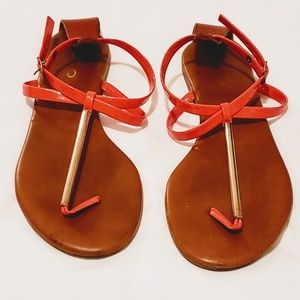 Also orange strap sandals
